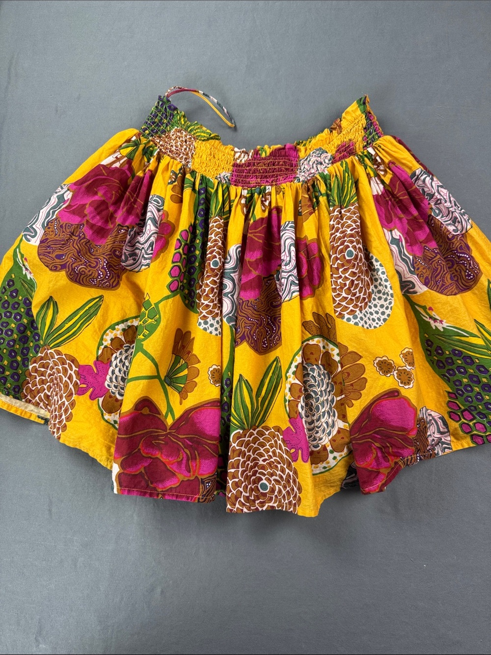 Anthropologie Let Me Be Mini Skirt Yellow Tropical Floral Smocked Size SP